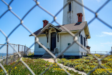 Pigeon Point Lighthouse, California. Looking through the fence around the lighthouse. 