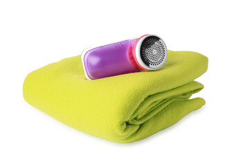 Fabric shaver and woolen cloth with lint on white background