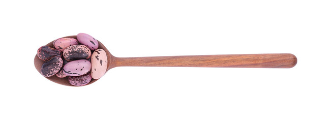 Wooden spoon with dry kidney beans isolated on white, top view
