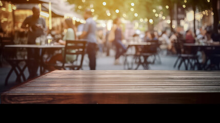 An outdoor table where people are watching some people blur background