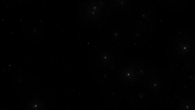 Sparkling colourful stars, particles shine effect in black background. blinking dots motion with black screen animation 4k