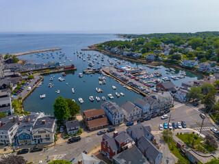 Fototapeta na wymiar Rockport Harbor aerial view including Bearskin Neck and Motif Number 1 building in historic waterfront village of Rockport, Massachusetts MA, USA. 