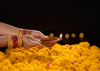 Happy Diwali - Diya lamps lit during diwali celebration