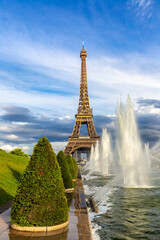 Eiffel Tower and fountains of Trocadero in Paris at sunset, France