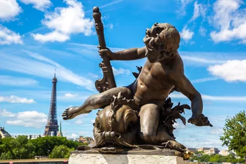 Papier Peint photo Pont Alexandre III Bronze sculpture on the Bridge Pont Alexandre III and Eiffel Tower in the behind in Paris, France