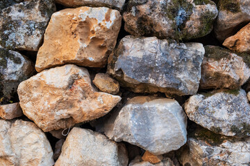 Texture of a stone wall. Old castle stone wall texture background. Stone wall as a background or texture. Part of a stone wall, for background or texture