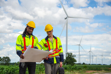 Wind turbine Engineer team working in wind turbine farm , Generator station, renewable energy