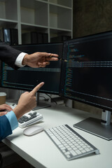 IT programmer working on desktop computer Male expert innovating software engineer app development...