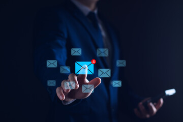 New email notification concept for business e-mail communication and digital marketing. Inbox receiving electronic message alert. business people touch on email in virtual screen. internet technology.