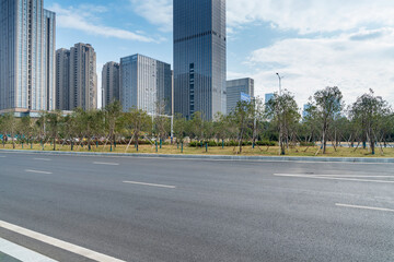 Empty urban road and buildings in the city - 630179965