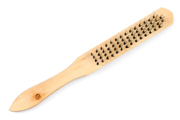 Wooden brush with metal bristles on a white background. Construction wooden brush close-up.