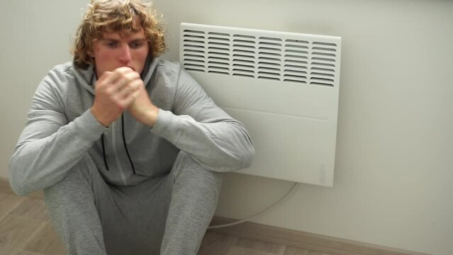 heating convector man warming up electric batteries