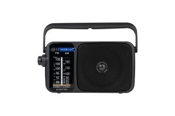 Radio receiver on a white background. Black portable wireless radio close-up isolated on a white background.