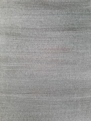 Gray background painted with a brush. Horizontal stripes from the pile of the brush.