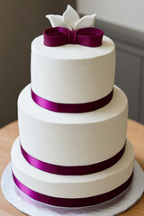 A cake with a purple ribbon. Generative AI