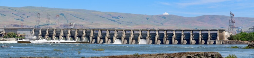 Panorama of water flowing through the Dalles Dam at The Dalles, Oregon, USA