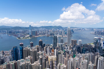 Panorama of skyline of Victoria Harbour in Hong Kong city - obrazy, fototapety, plakaty