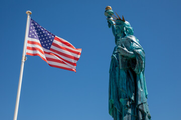 American flag mat stars united states and The Statue of Liberty neoclassical sculpture on Liberty Island