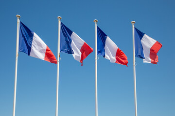 france four flags line french wave over a blue sky waving on mat