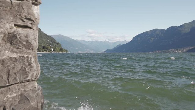 Waves Splashing Against Man Made Wall at Lake Como In Italy - Static Slowmo