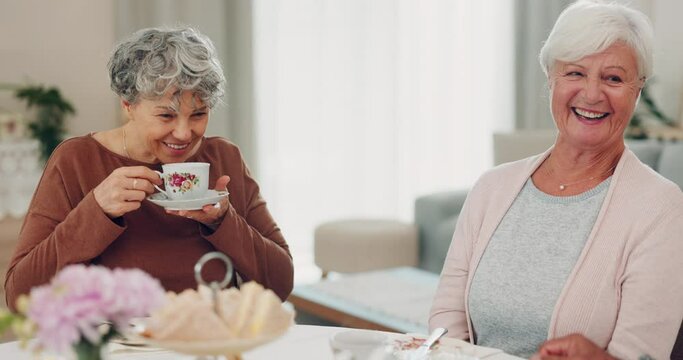 Senior man, women and pouring tea with care, drink and chat in retirement, teacup and smile in house. Elderly group, talk and relax with reunion, coffee and happy at brunch with social event in home