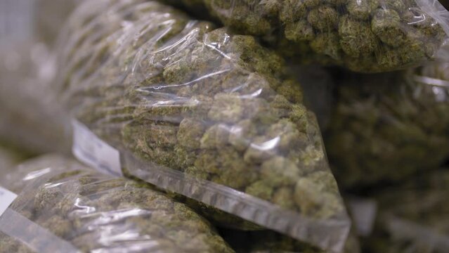 Bags of Marijuana stacked and ready to ship, white label cannabis prodution