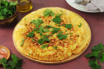 Frittata, traditional egg and potato omelette, Italian dish