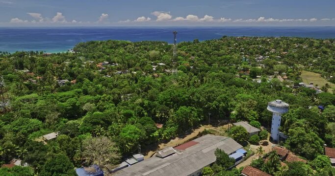Gandara Sri Lanka Aerial v1 panoramic panning view drone flyover and around Thalalla Central residential neighborhood capturing beautiful Indian ocean views - Shot with Mavic 3 Cine - April 2023