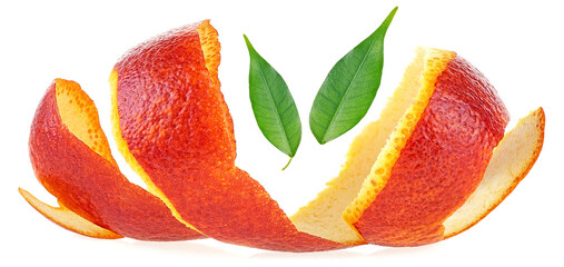 Spiral shaped peel of red sicilian orange fruit and green leaves isolated on a white background....