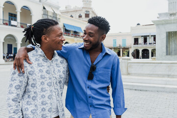portrait of african american gay couple in Latin America, afro caribbean black people from Hispanic...