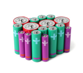 Many different new batteries isolated on white