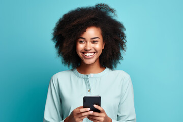 woman with phone on blue background.