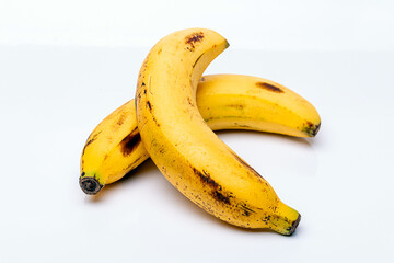 Bananas, expired yellow bananas on white background