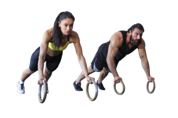 Sporty man and woman doing push-ups on rings on a transparent background