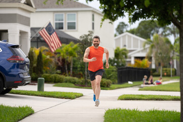 The running man enjoys freedom of running outdoor. running man feels sense of joy during the run. activity for a healthier you. sport fit man jogging outdoor. running man races down the neighbourhood - obrazy, fototapety, plakaty