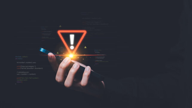 Programmer and virtual icons , exclamation mark ,alarm,computer virus detected ,danger warning concept or information error that should be urgently fixed and repaired ,Notification of security issues