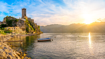 Landscape with Malcesine town at sunset, Garda Lake, Italy - obrazy, fototapety, plakaty