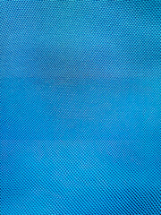 Fototapeta na wymiar Rich blue cloth background or texture pattern