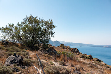 Fototapeta na wymiar Santorini coastal landscape with caldera in background