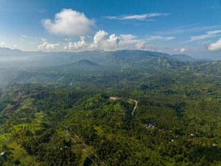 Mountain landscape: Mountain slopes covered with rainforest and jungle View from above. Mindanao. Philippines.