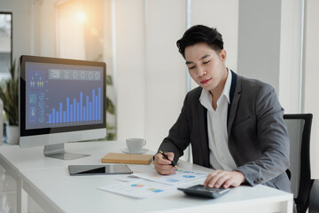 Technology and financial advisory services concert. Businessman working on digital laptop computer with advisor showing plan of investment to clients at table office. Digital marketing, Stock market.