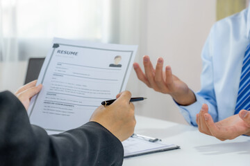 Office executives hand holding pen and interviewing job applicants in the meeting room. employer conversation summary work employment