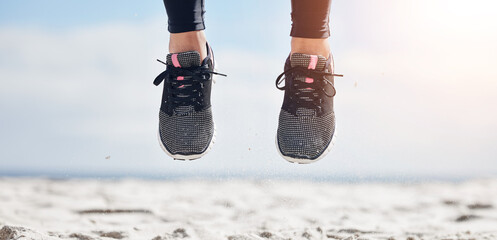 Woman, fitness and shoes jumping on mockup in air for sports motivation, running or outdoor...