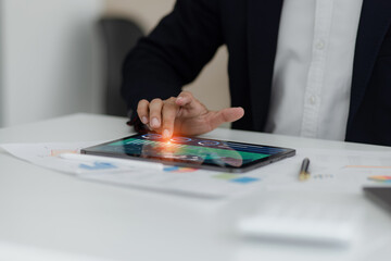 Technology and financial advisory services concert. Business teamwork and working on digital laptop computer with advisor showing plan of investment to clients at table office. Digital marketing.