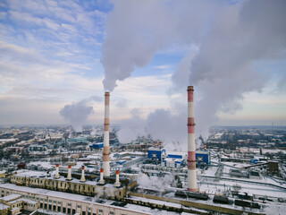 Industrial factory smokestack emission smoke from natural gas in atmosphere. Industry zone, factory smoke plumes. Global energy crisis