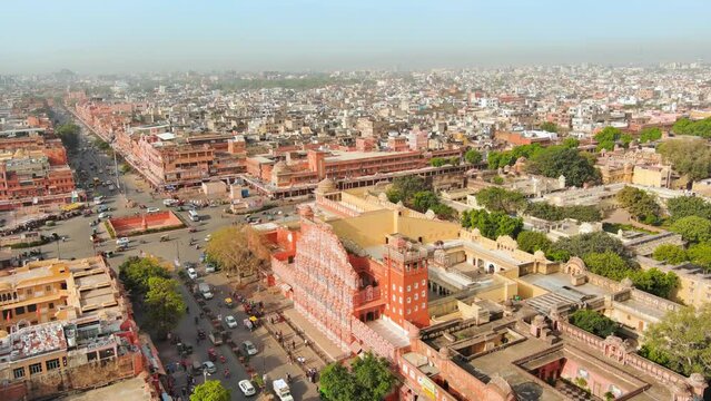 Jaipur, India: Aerial view of capital and largest city of Rajasthan, famous palace The Hawa Mahal, built from red and pink sandstone - landscape panorama of South Asia from above