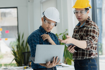 Asian engineer team and architects working designing planing of project, Home renovation concept.  
