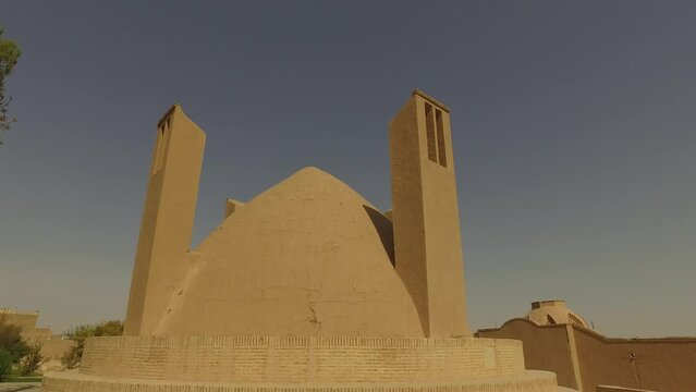Wind towers used as a cooling for water reservoir Meybod Iran