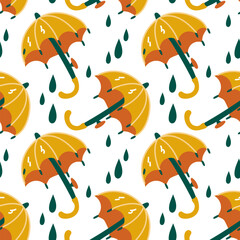 Fototapeta premium A pattern of yellow umbrellas with raindrops on an autumn theme. Cartoon style. A symbol of comfort. Vector illustration of a falling umbrella in the rain. printing on textiles and paper. Packaging