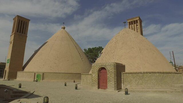 Wind towers used as cooling for water reservoir Nain Iran